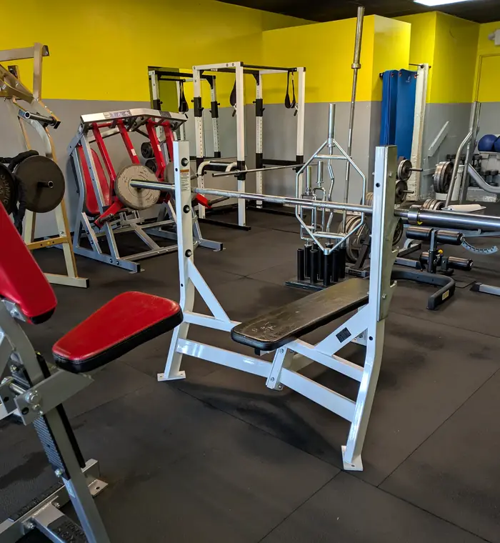 Commercial gym floor and equipment area after cleaning